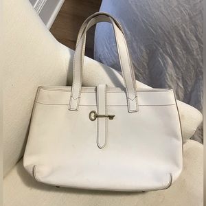 Large White and gold Fossil purse